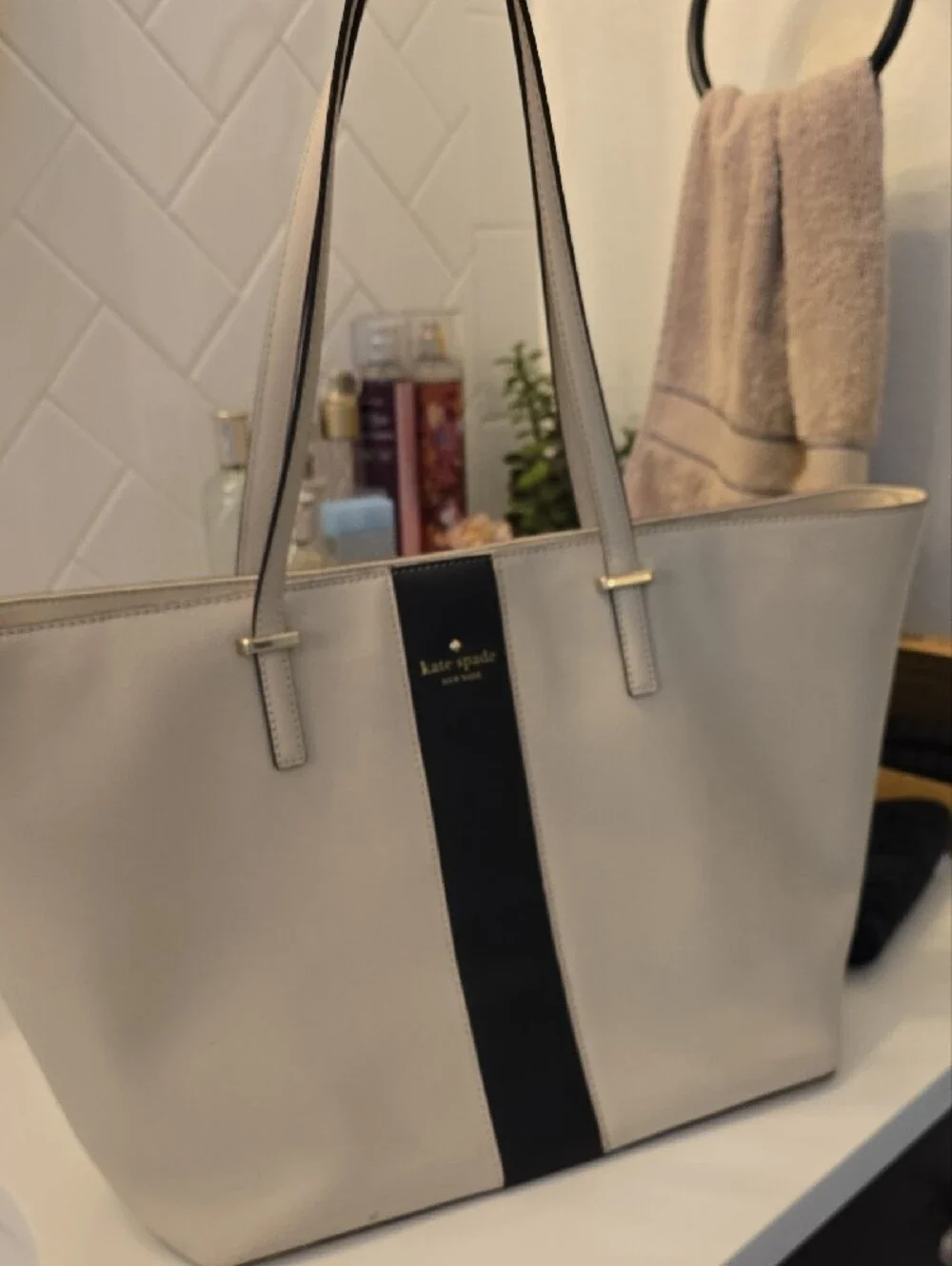 kate spade cream tote with black center stripe